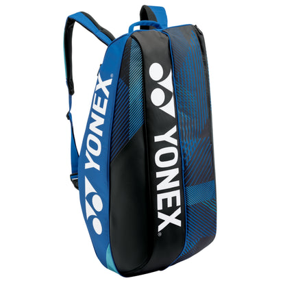 Blue and black Yonex tennis bag on a white background