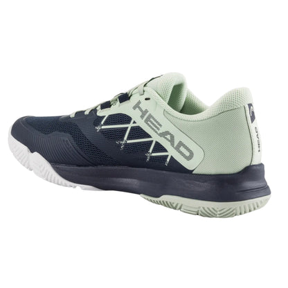 Navy and light green Head padel shoe with HEAD logo on a white background