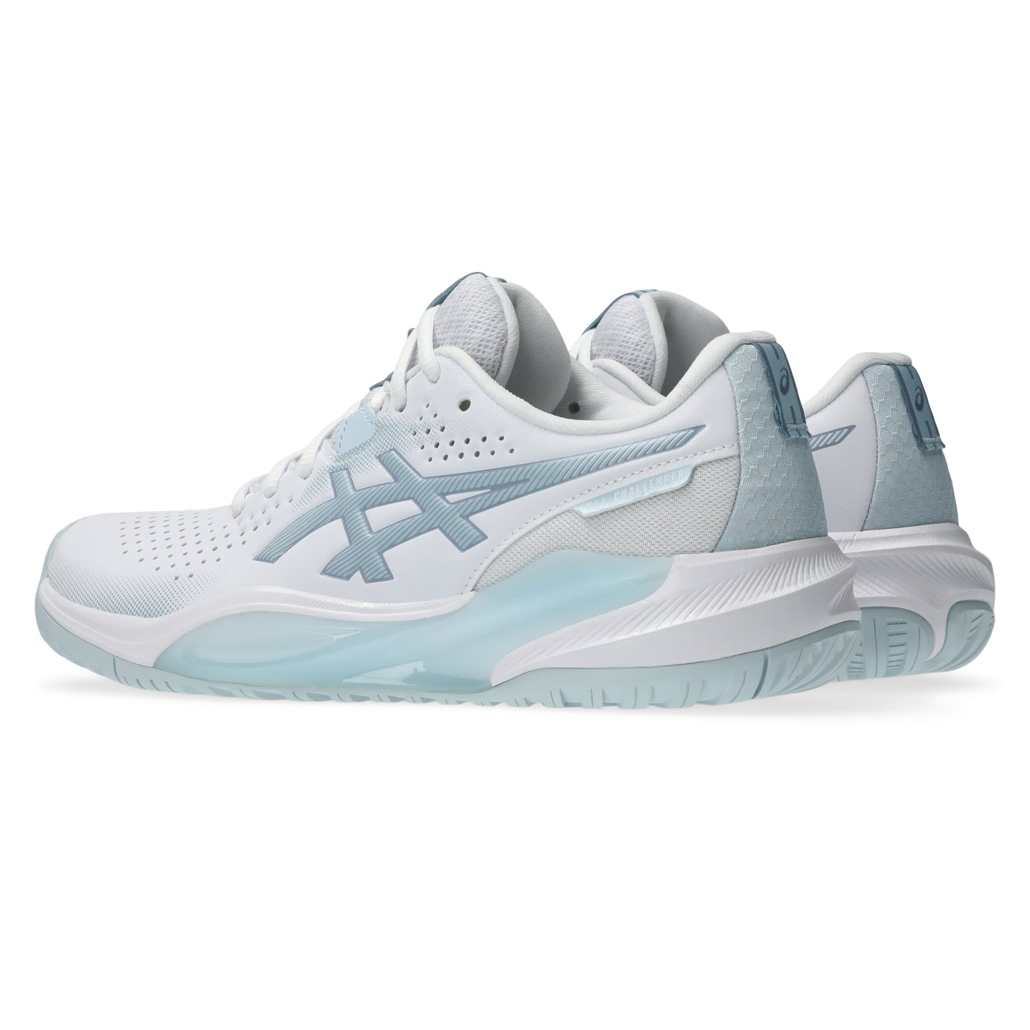 White and light blue tennis shoes on a white background