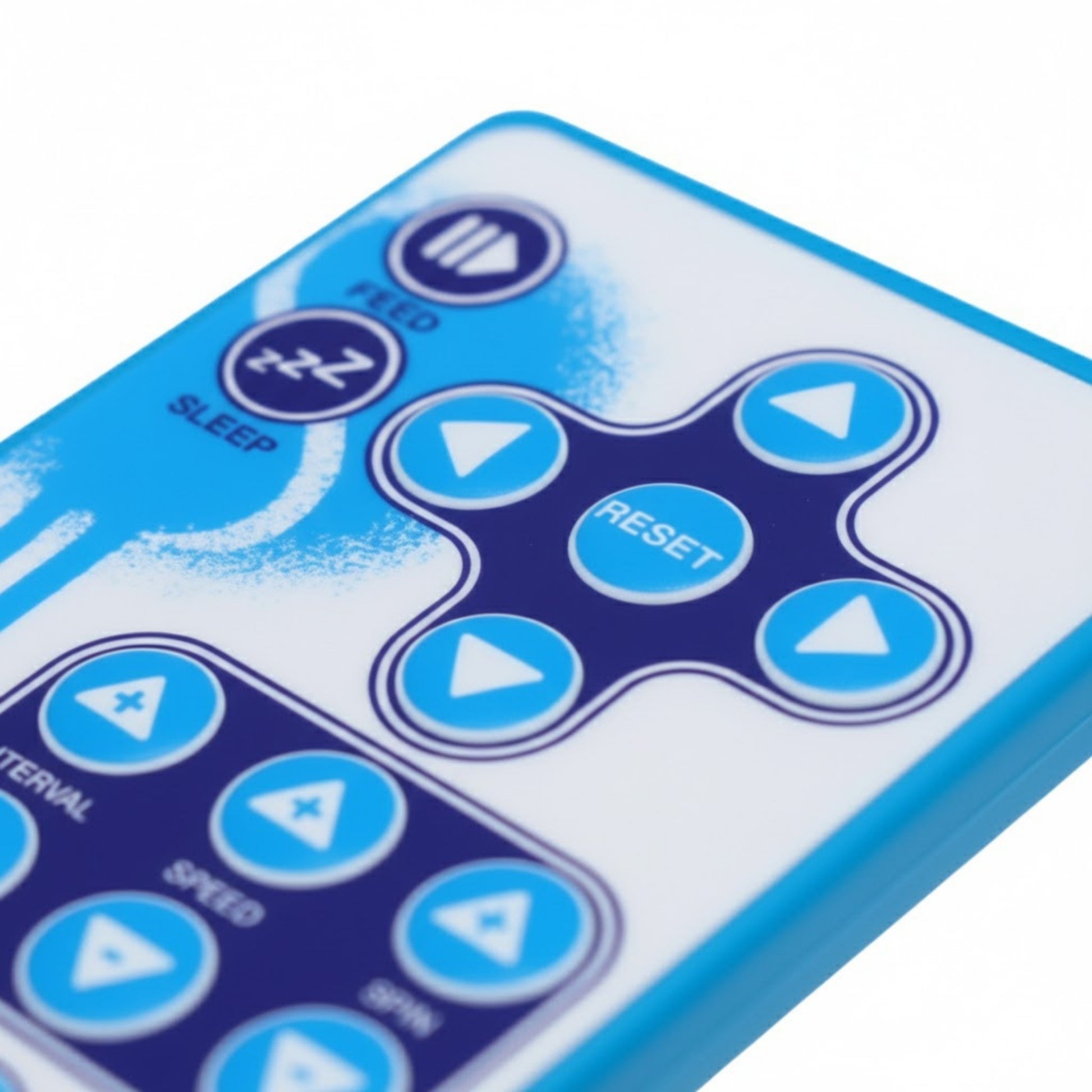 Close-up of a blue and white Spinfire remote with control buttons on a white background