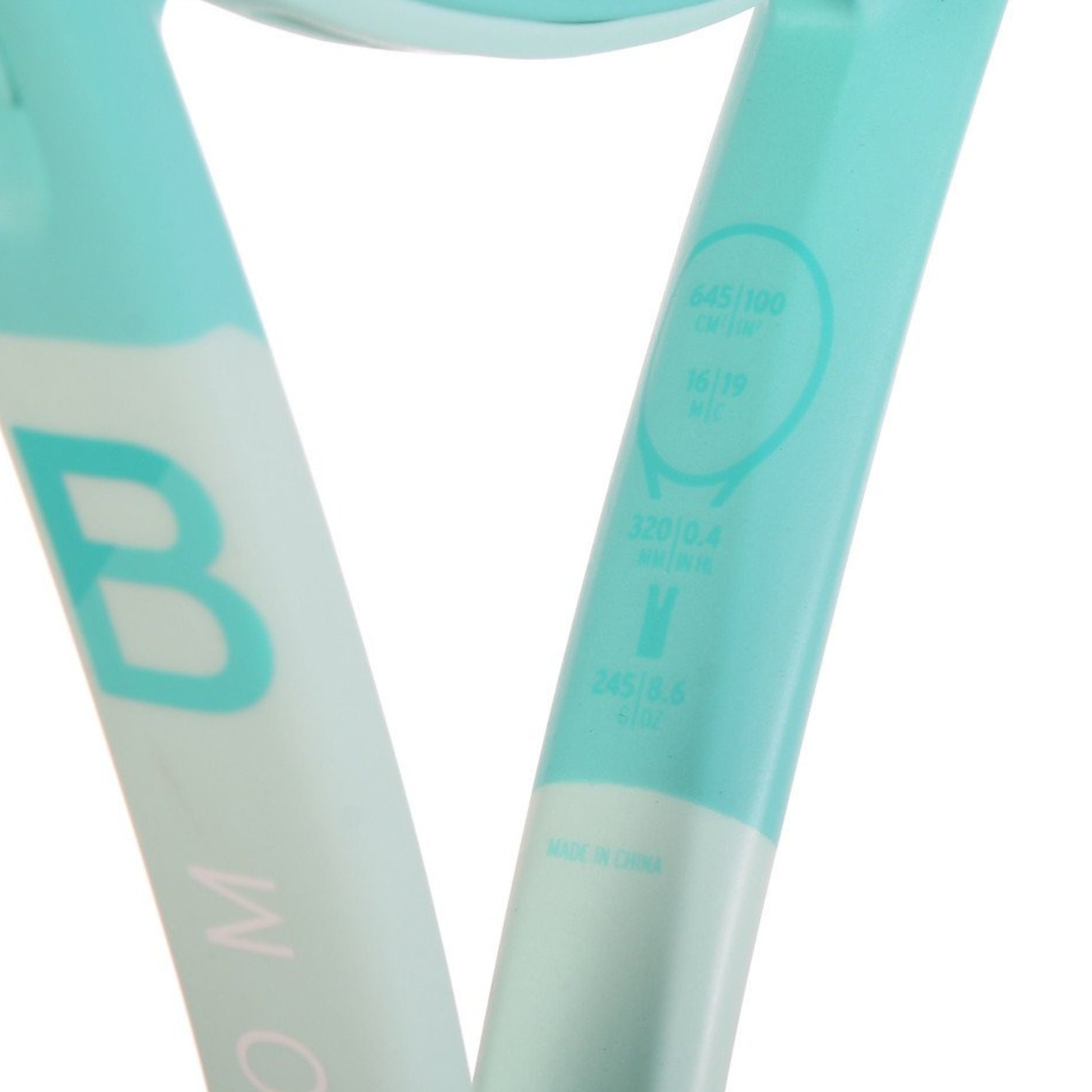 Close-up of a light blue and white tennis racket with branding on a white background