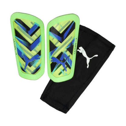 Green and blue shin guards with Puma logo on a white background