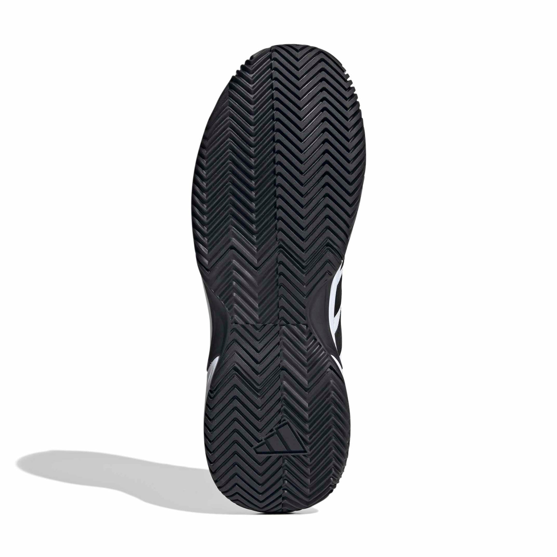 Black tennis shoe sole with logo on a white background