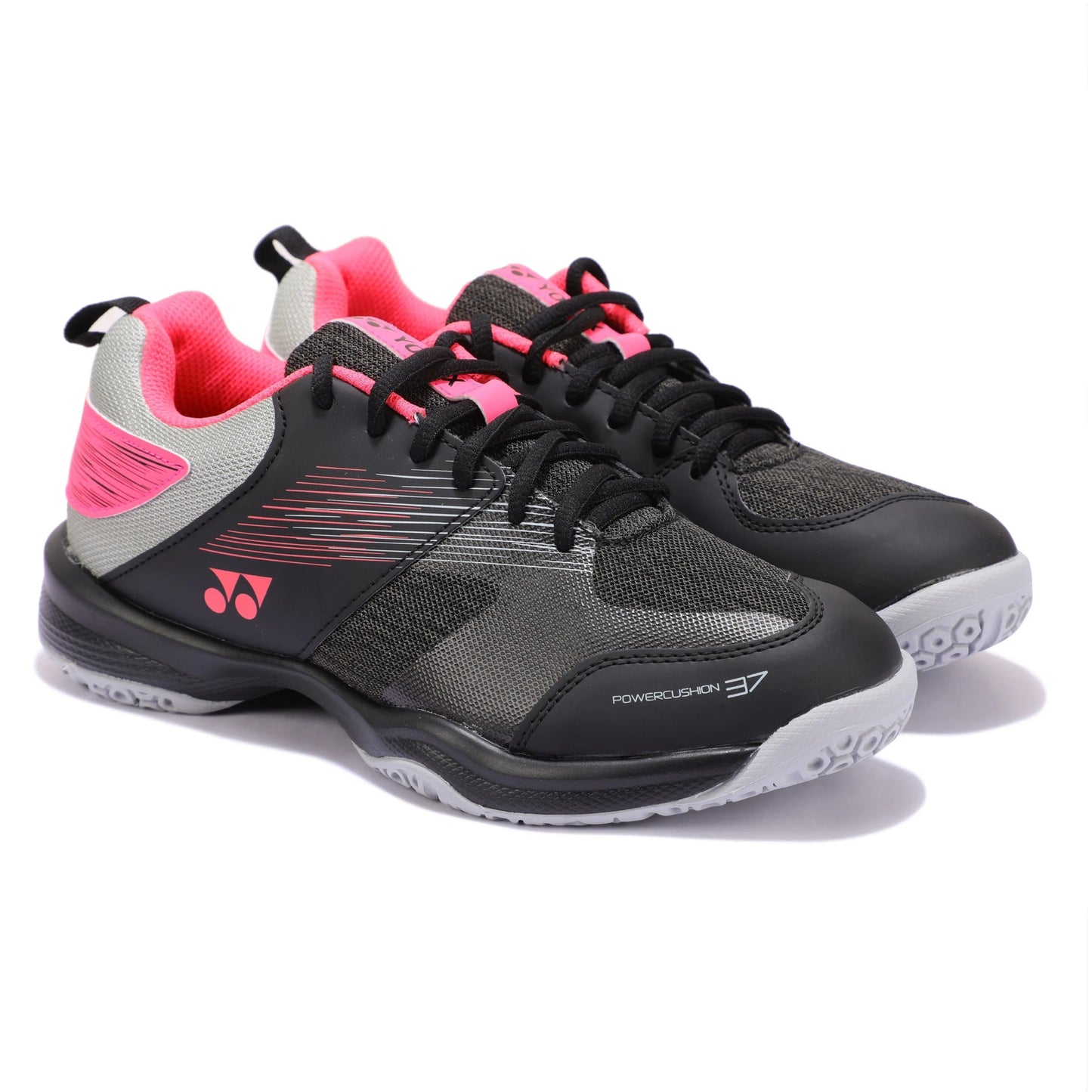 Pair of black and gray Yonex shoes with pink accents on a white background