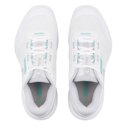 White Head tennis shoes with blue accents on a white background