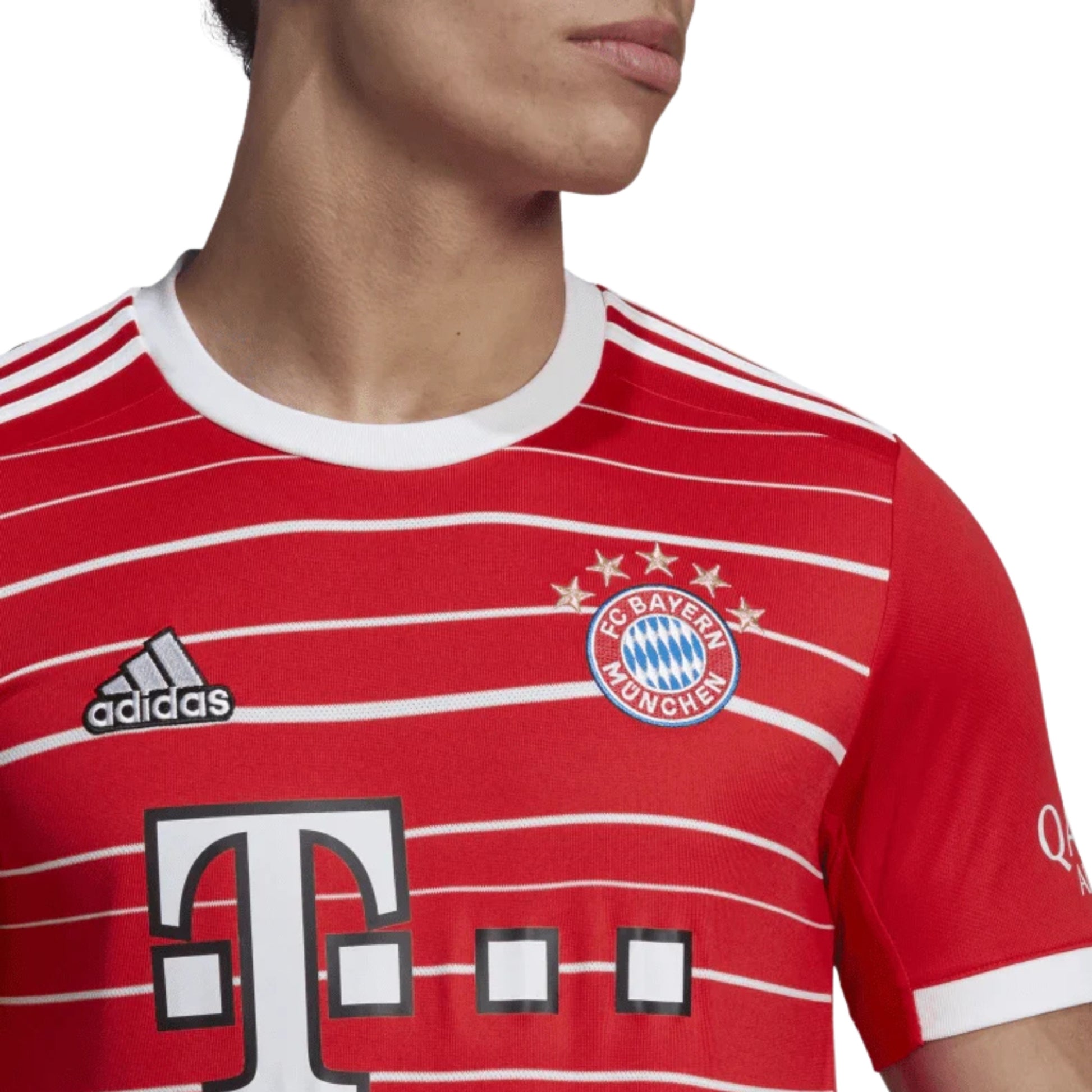 Red and white striped sports jersey with Adidas and Bayern Munich logos.