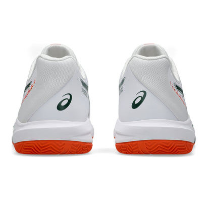 A pair of white Asics padel shoes shown from the back, featuring a white mesh upper, a dark green Asics logo, and a vibrant orange wavy outsole.