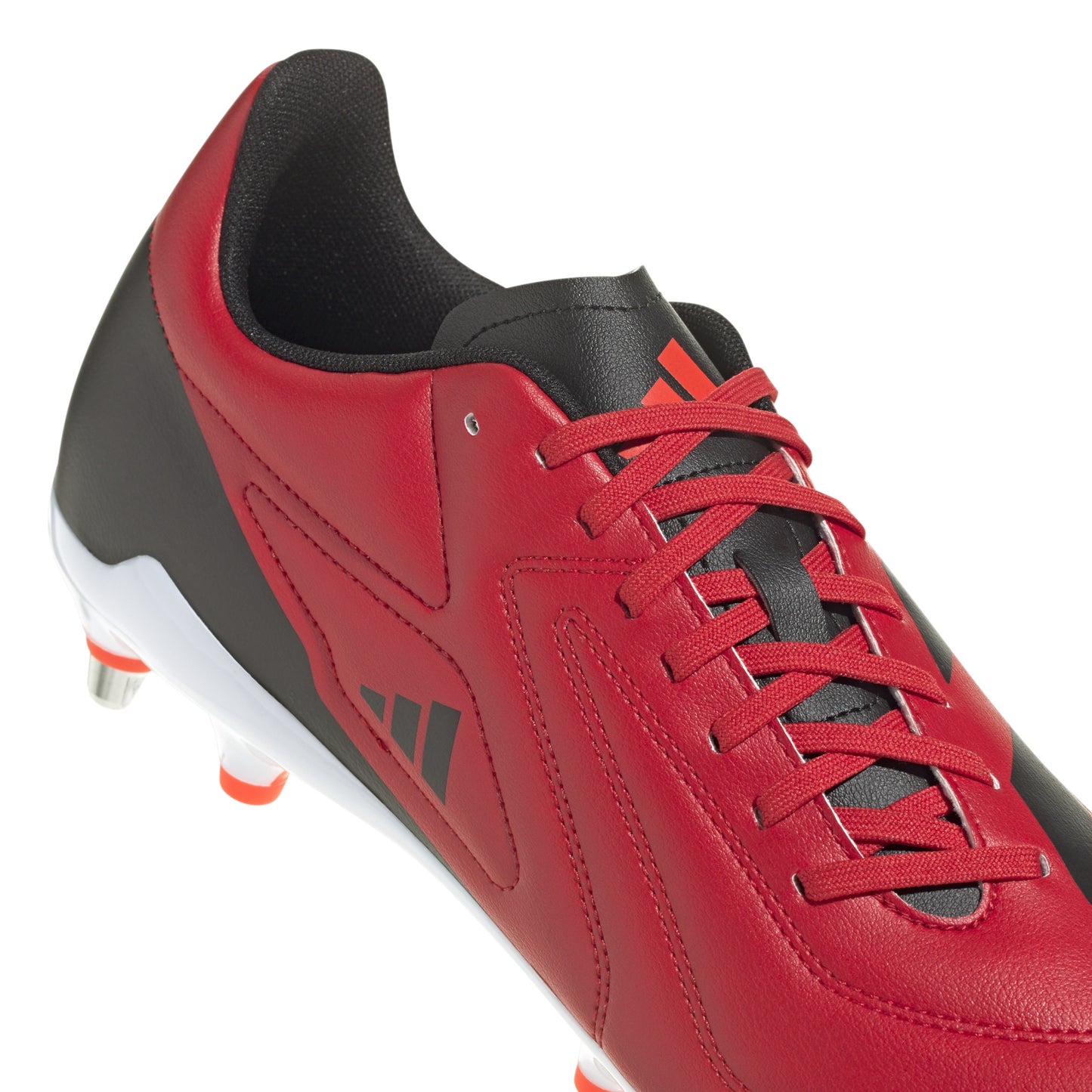 Red and black rugby boot with white sole on a white background