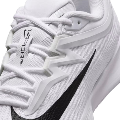 White tennis shoe with black swoosh logo on a white background