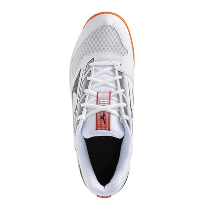 A white Mizuno squash shoe with a black logo, a dark gray heel accent, and an orange outsole, shown in a side profile on a white background.