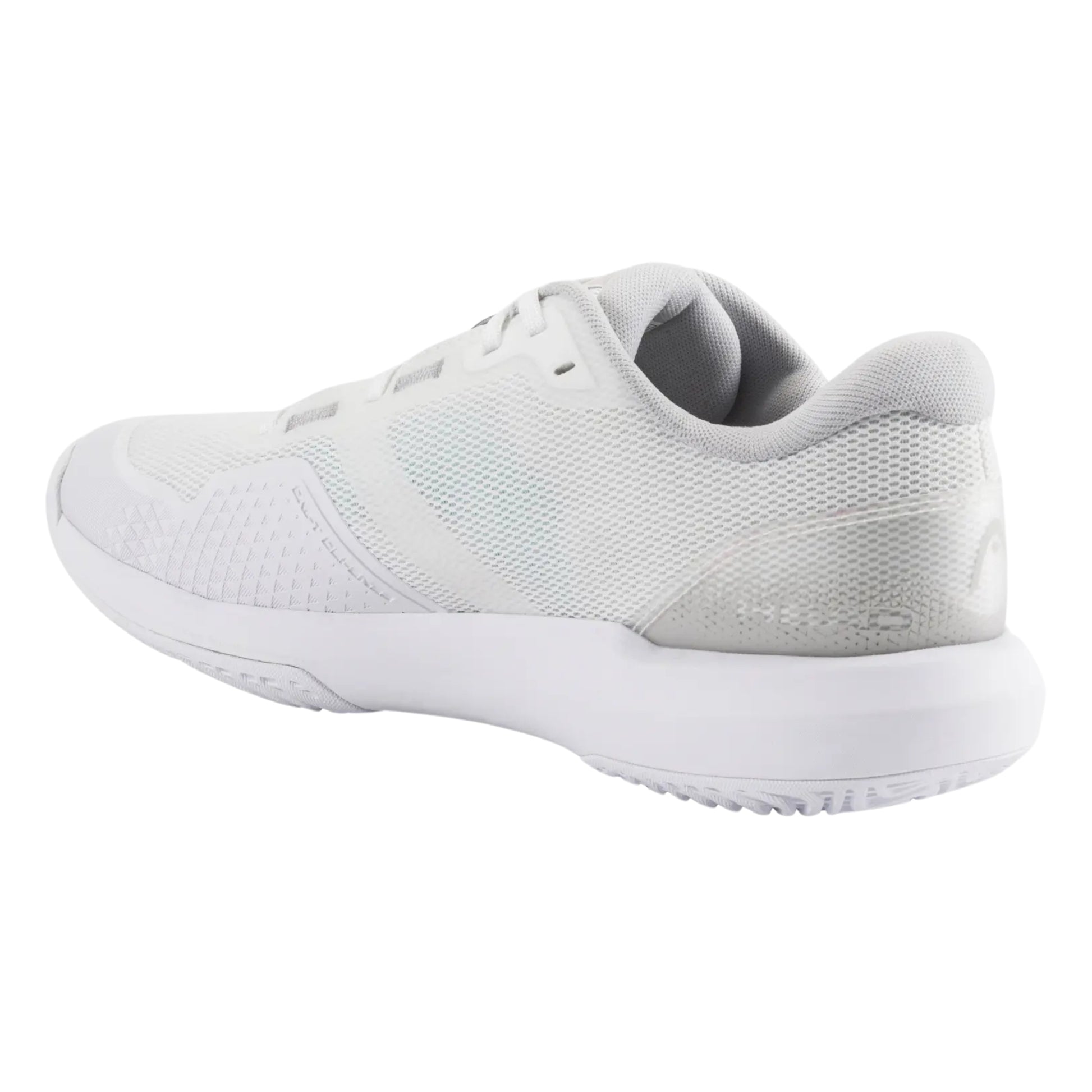 White Head tennis shoe with teal accents on a white background