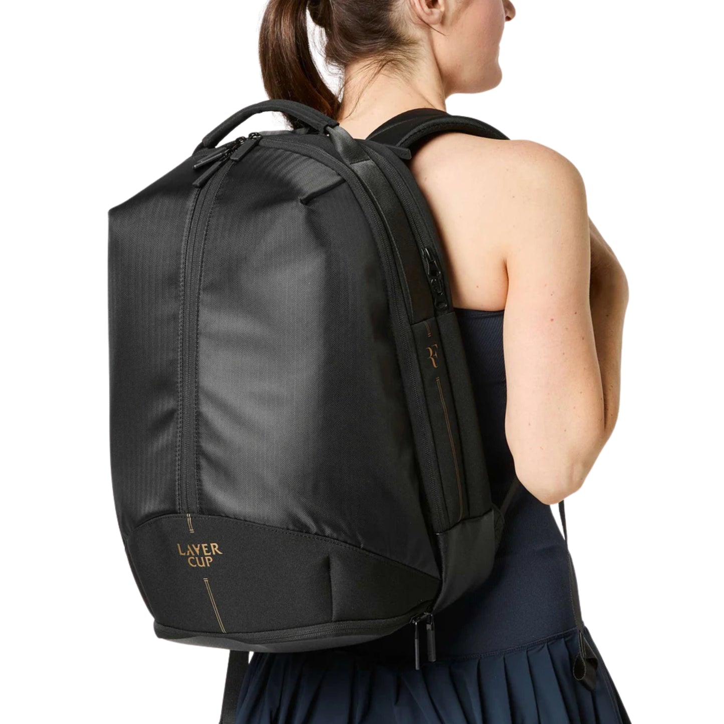 Person wearing a black backpack with 'Laver Cup' branding on a white background