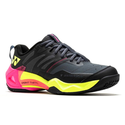 Black and neon yellow Yonex shoe with pink accents on a white background