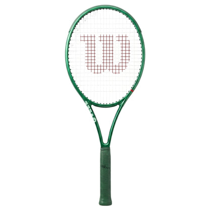 Green Wilson tennis racket with a white strings background on a white background