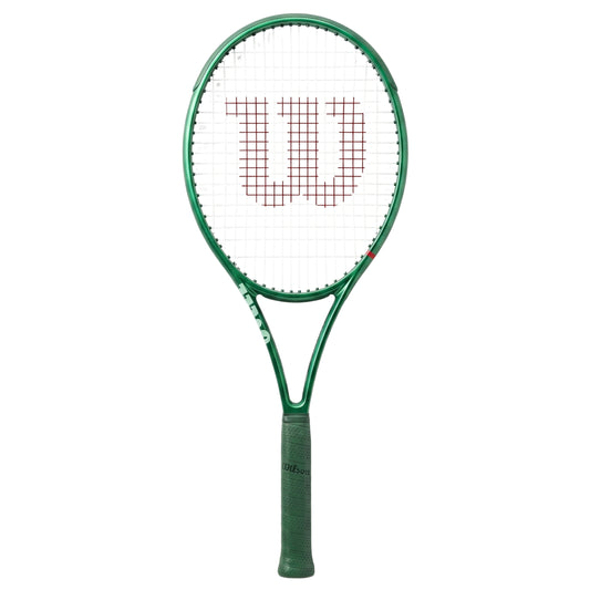 Green Wilson tennis racket with a white strings background on a white background