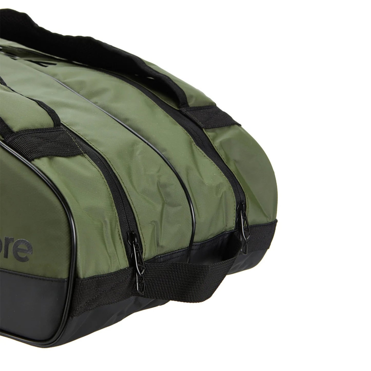 Green tennis bag with black straps on a white background