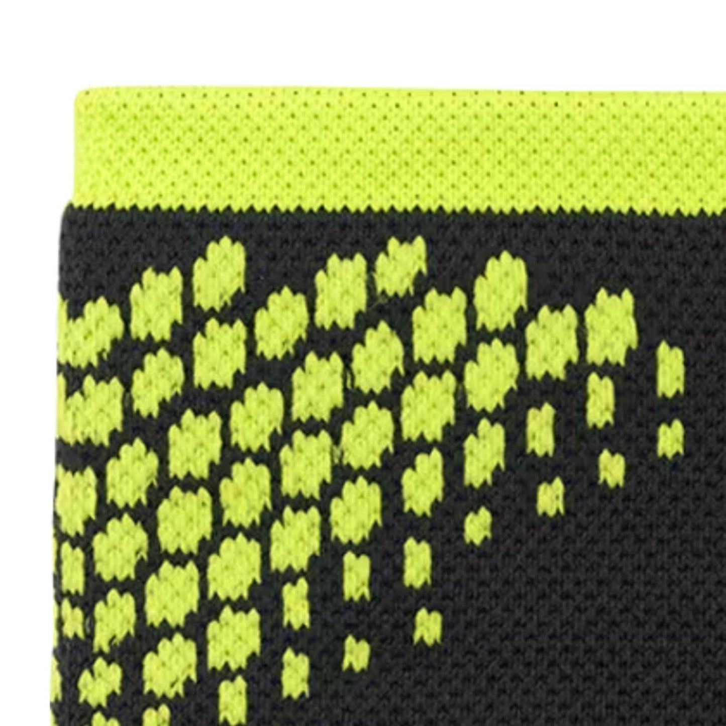 Close-up of a black and green textured wristband