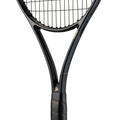 Close-up of a black Head tennis racket on a white background