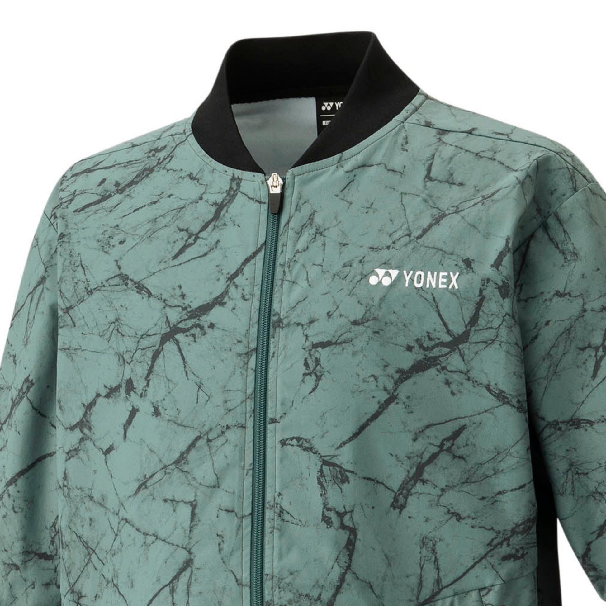 Green patterned jacket with Yonex logo on a white background