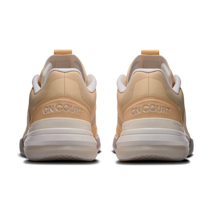 A pair of beige and white On shoe shown from the back, featuring the text 'ON COURT' embossed on the heel area.