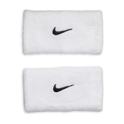 Two white wristbands with black Nike logos on a white background