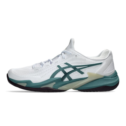 White and dark green Asics tennis shoe with a black sole on a white background