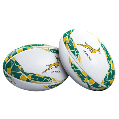 Two rugby balls with green and yellow patterns on a white background