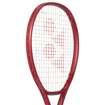 Red tennis racket with a white background