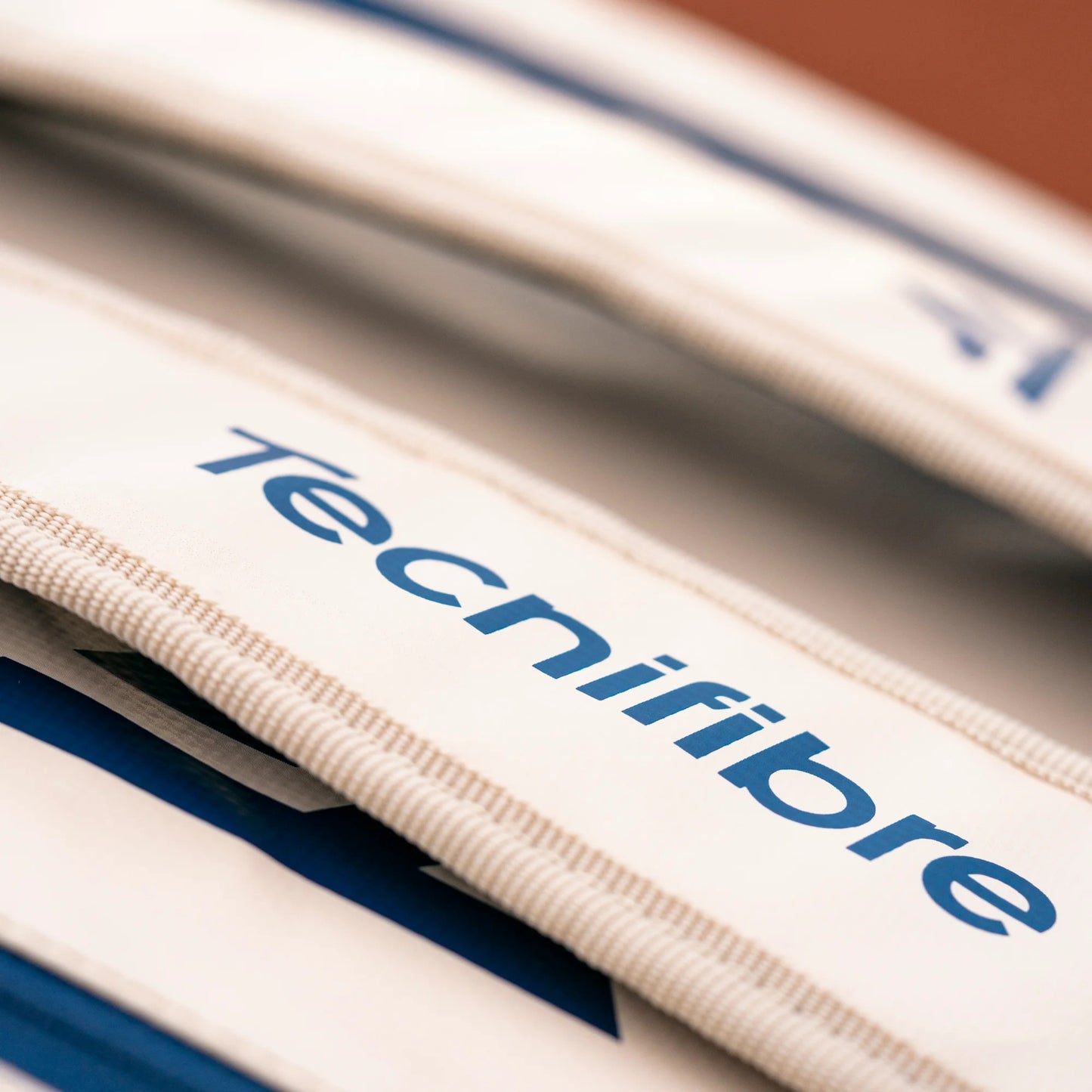 Close-up of Technifibre branded sports bag with a focus on the brand name.
