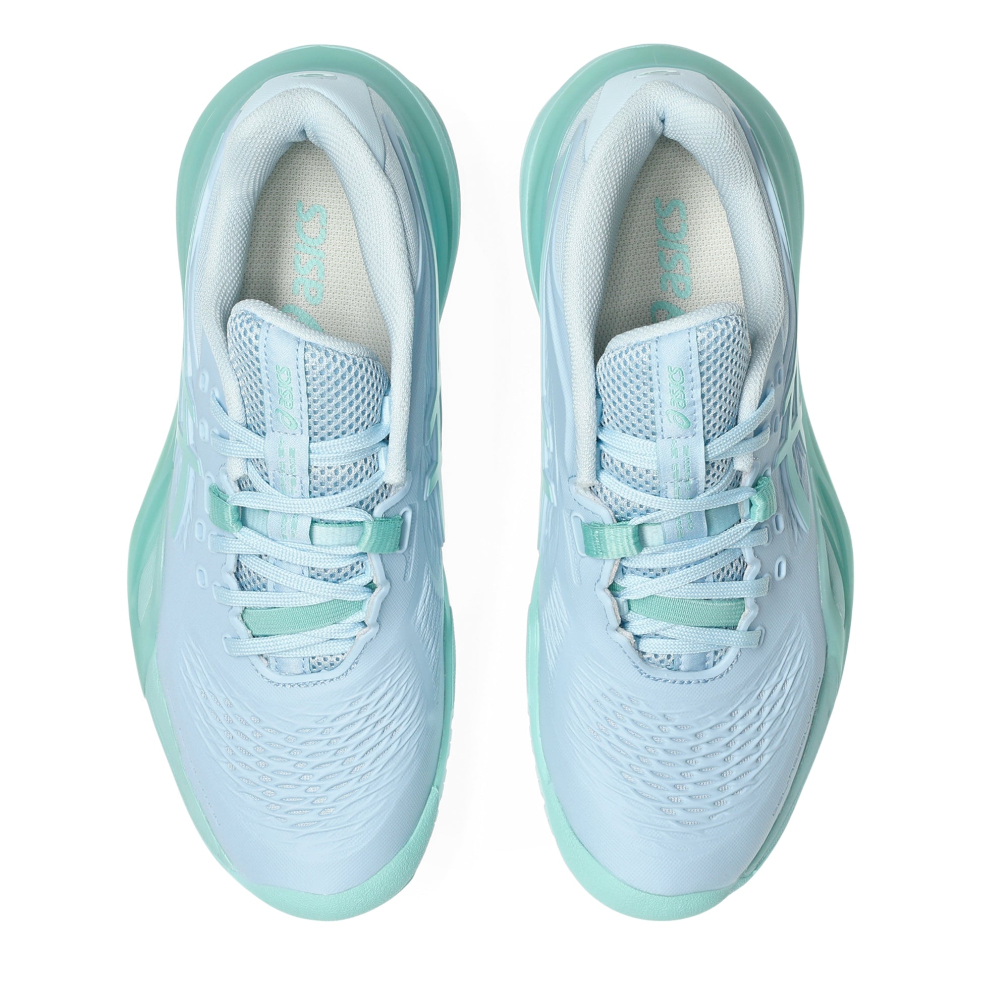 A pair of Asics tennis shoes in light blue and mint green, shown from a three-quarters angle on a white background.