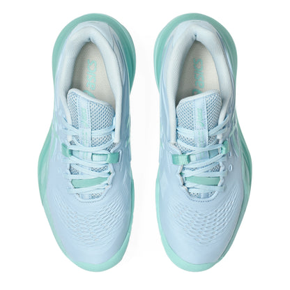 A pair of Asics tennis shoes in light blue and mint green, shown from a three-quarters angle on a white background.