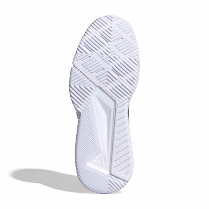 White padel shoe sole with tread pattern on a white background