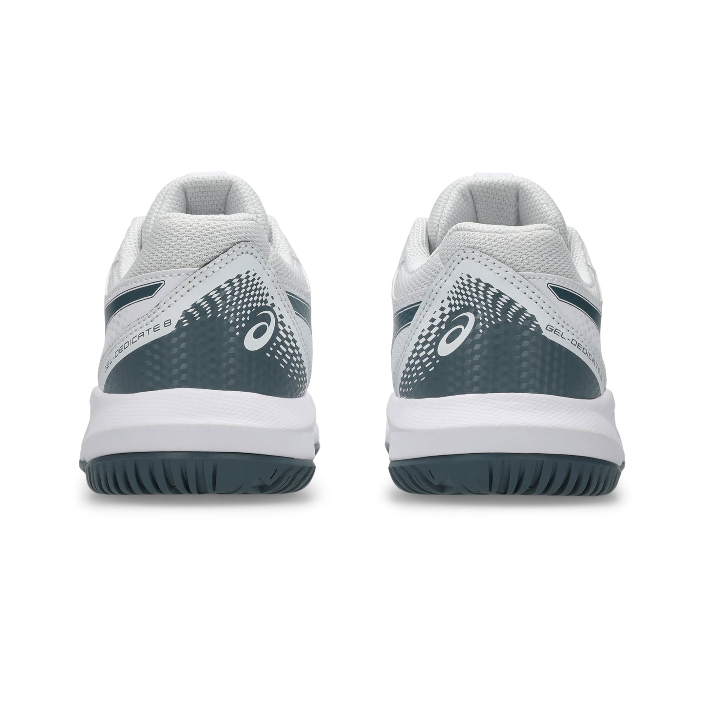 White tennis kids shoes with green accents on a white background