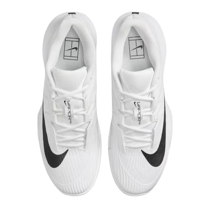 White tennis shoes with black swoosh logo on a white background
