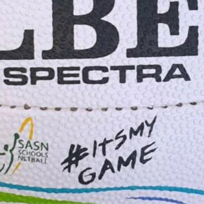 Close-up of a netball ball with branding and text, including 'SASN Schools Netball' and '#ITSMYGAME'.