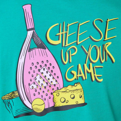 Close-up of a teal t-shirt with the wording cheese up your game with a padel racket