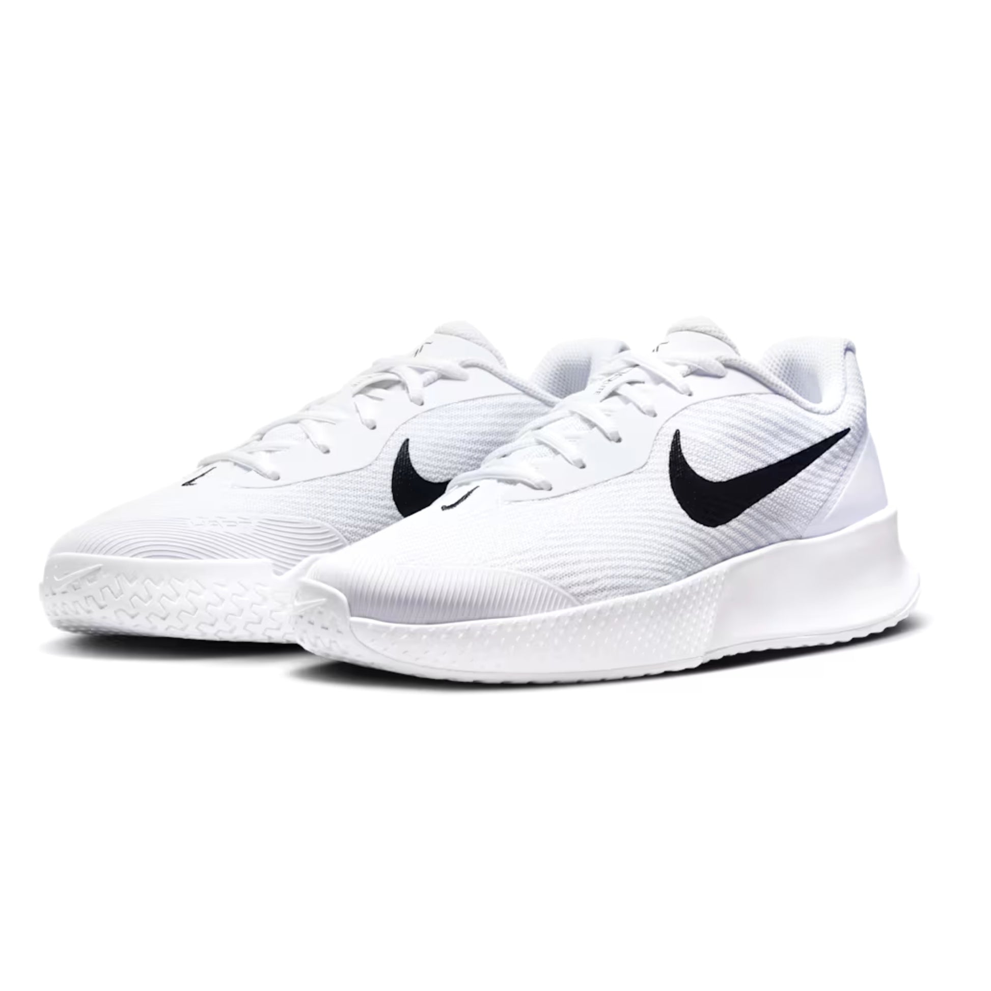 White tennis shoes with black Nike logo on a white background