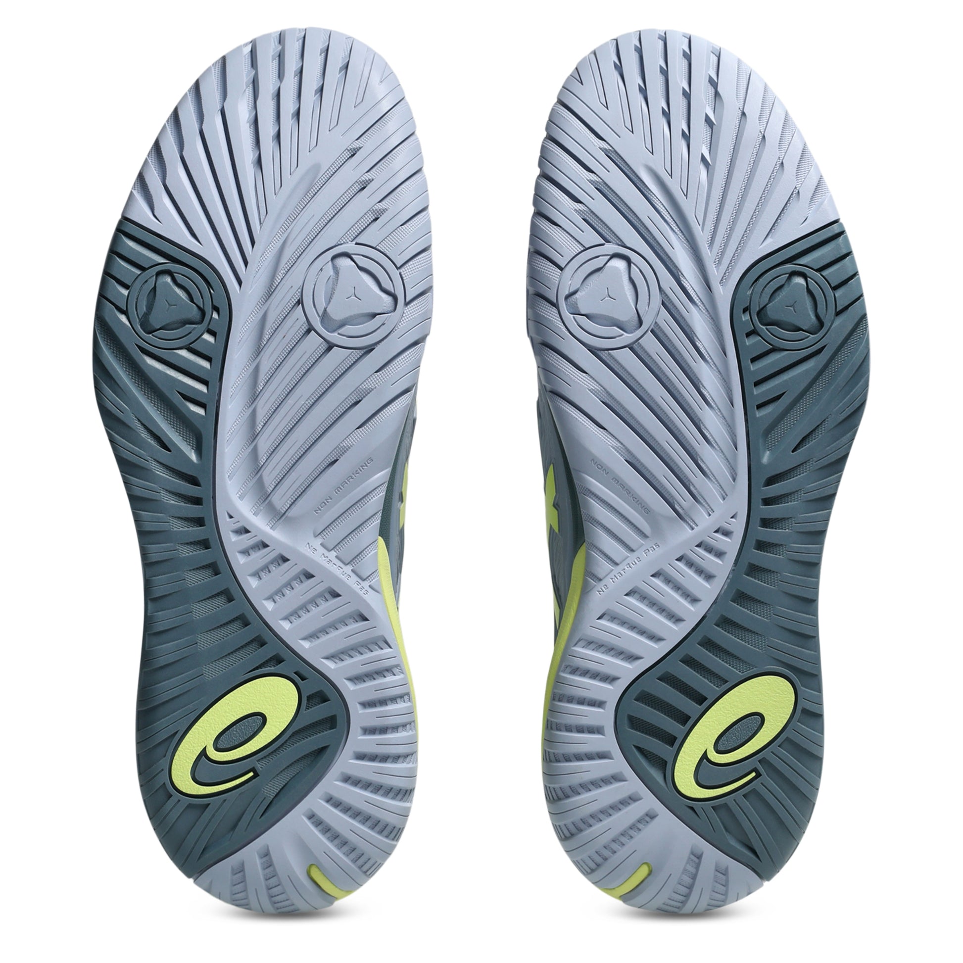 Gray tennis shoe sole with green logo on a white background