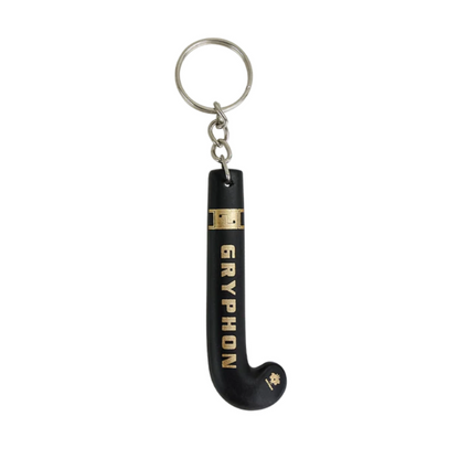 Keychain shaped like a hockey stick with 'Gryphon' branding on a white background