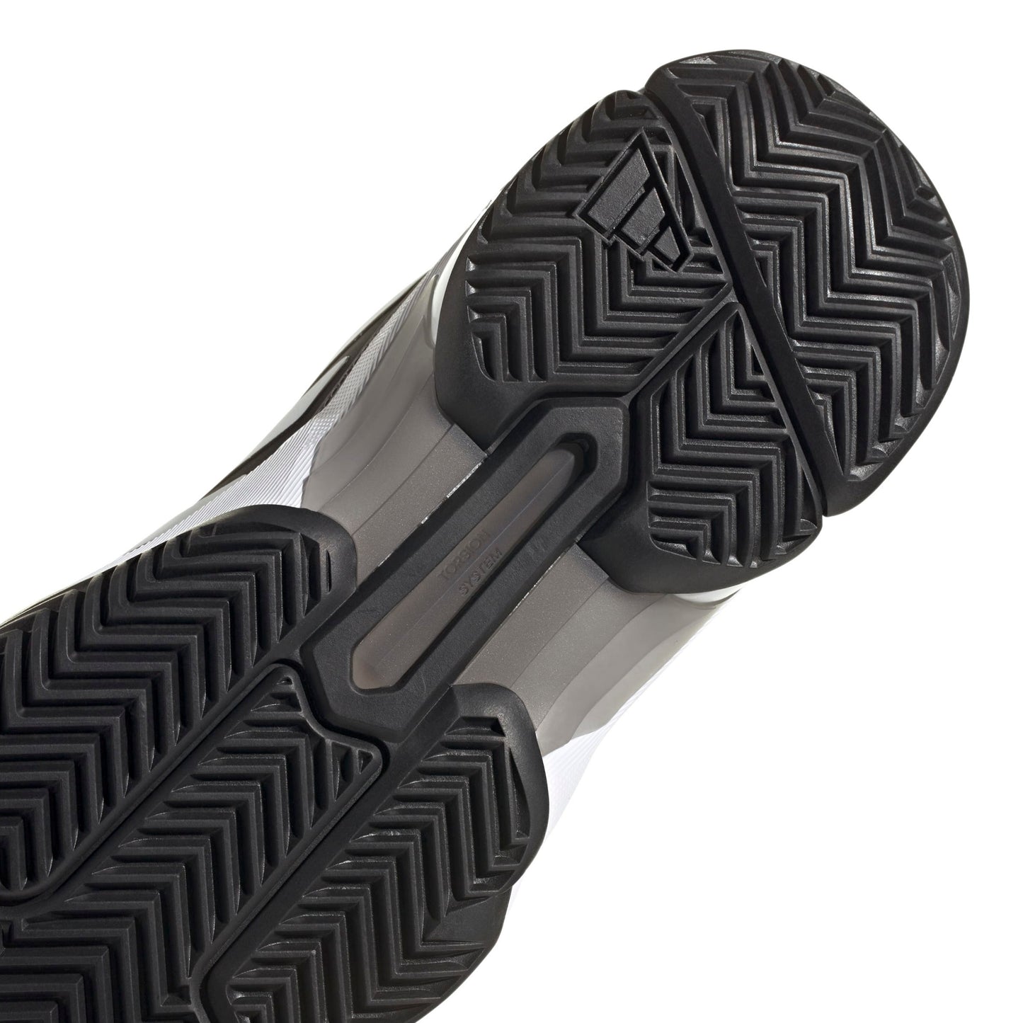 Close-up of a shoe sole with tread pattern on a white background