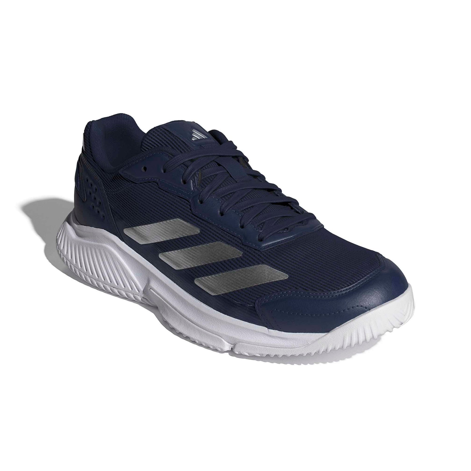 Navy adidas padel shoe with the white logo and a white sole on a white background