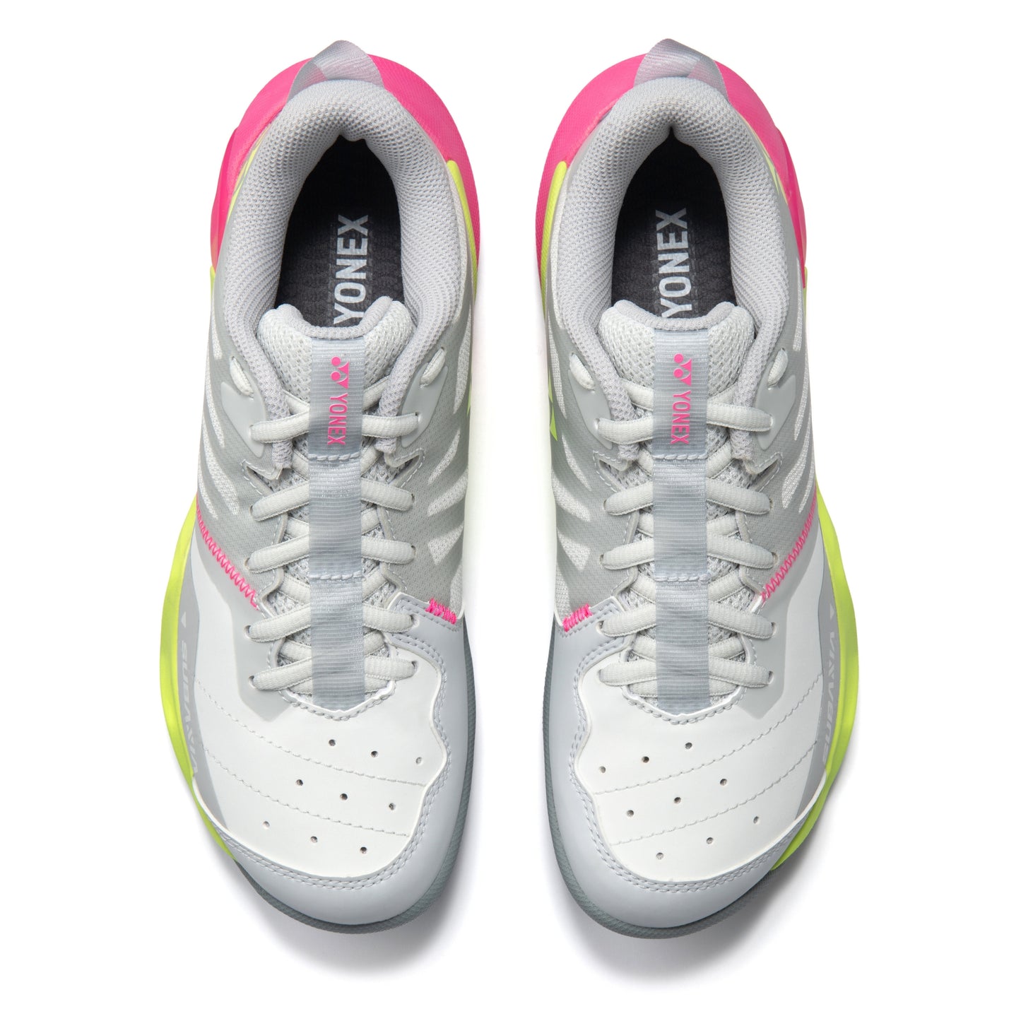White and pink Yonex shoes on a white background