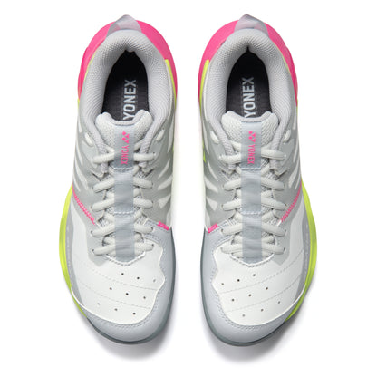 White and pink Yonex shoes on a white background