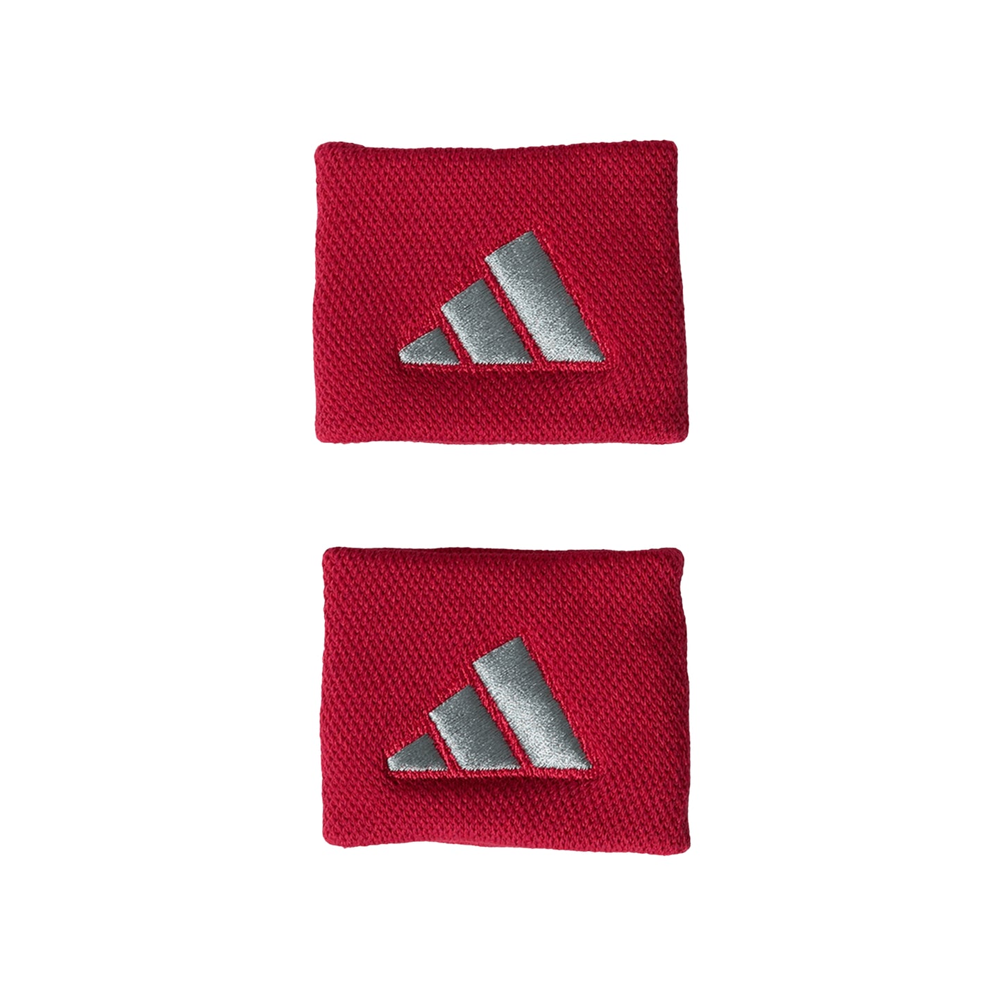 Two red wristbands with silver Adidas logo on a white background