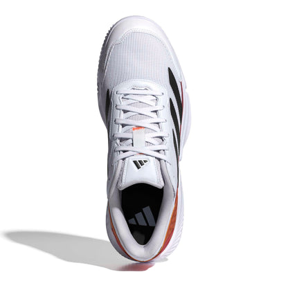 White padel shoe with black and red accents on a white background