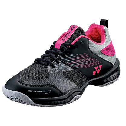 Pink and gray Yonex shoe with black accents on a white background