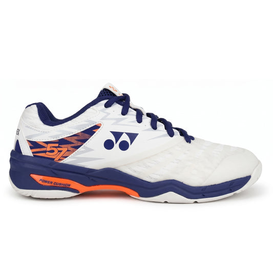 White Yonex squash shoe with blue and orange accents on a white background