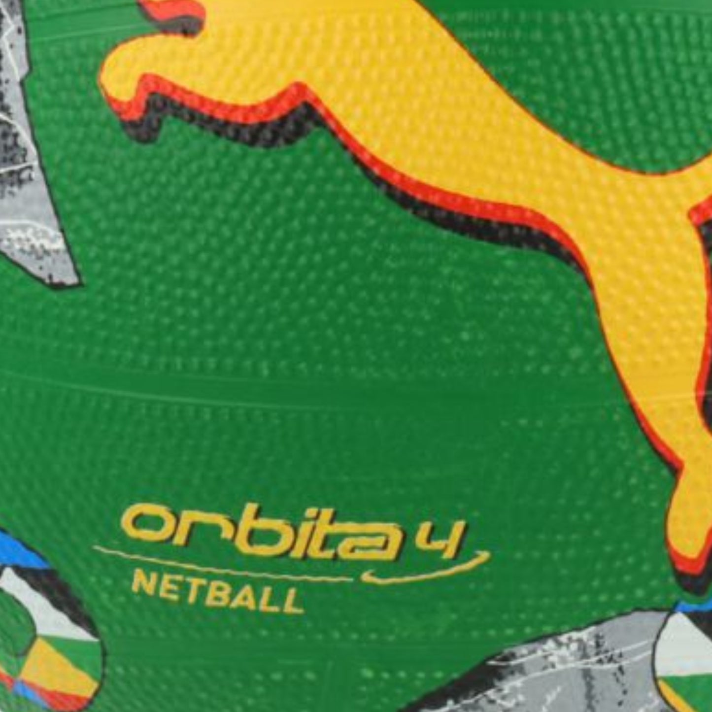 Green netball with colorful patterns and Puma logo on a white background