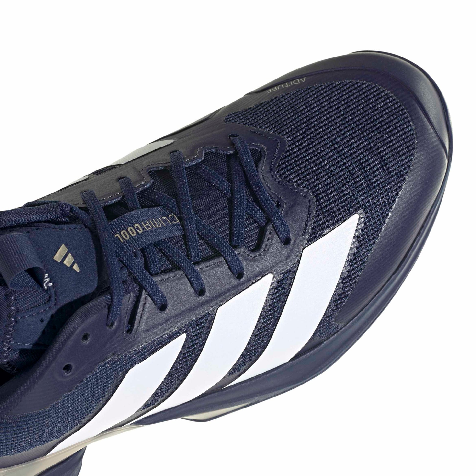 Navy blue adidas tennis shoe with white stripes on a white background