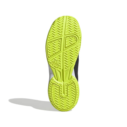 Close-up of a green Adidas tennis shoe sole with Adidas logo on a white background